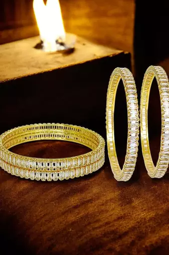 Gold set of 4 baguette american diamond bangles