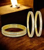 Gold set of 4 baguette american diamond bangles