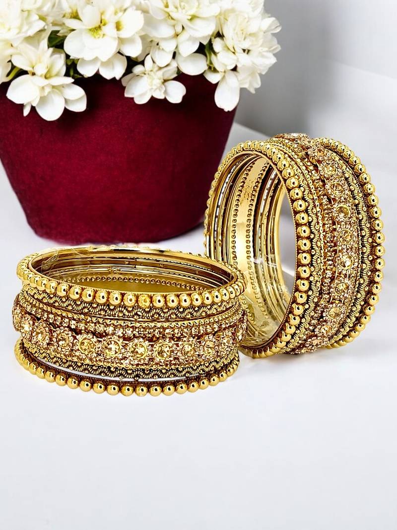 Antique gold plated set of 10 stone bangle set