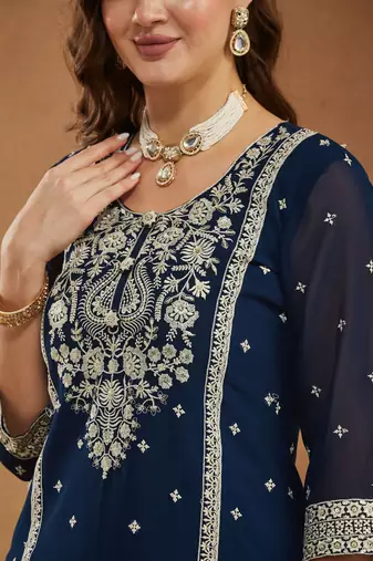 Riva enterprise embroidered navy blue georgette kurta palazzo & dupatta set.