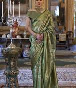Kanjivaram silk blend classic saree with woven work for women in green