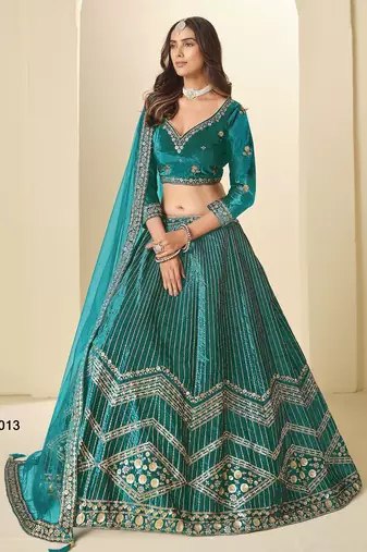 teal green ice velvelt lehenga set with choli and dupatta