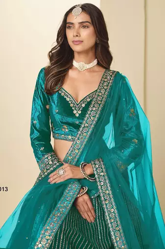 teal green ice velvelt lehenga set with choli and dupatta