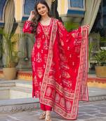Women red viscose ikat printed straight kurta trousers with dupatta