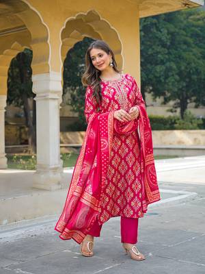 Women pink viscose ikat embroidered straight kurta trousers with dupatta 3