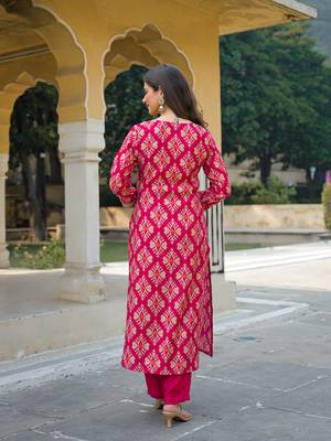 Women pink viscose ikat embroidered straight kurta trousers with dupatta 4