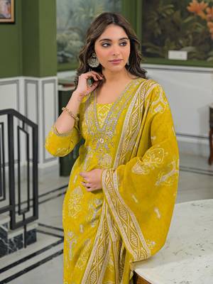 Women yellow viscose ikat printed straight kurta trousers with dupatta 2