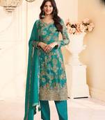 Teal green chinon semi stitched suit with multi digital printed work