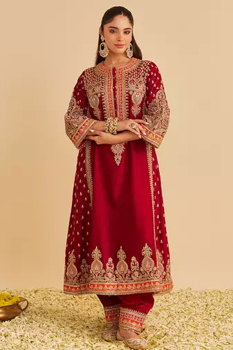 Red embroidered silk kurta set with dupatta