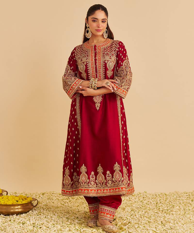 Red embroidered silk kurta set with dupatta