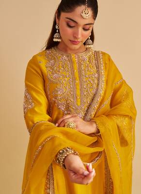 Yellow embroidered silk kurta set with dupatta 4