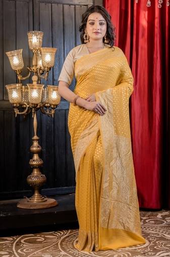 yellow woven georgette saree