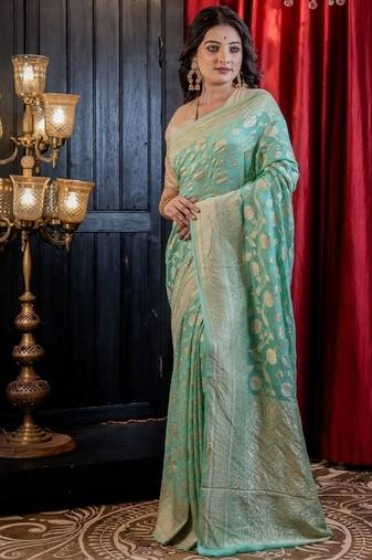green woven georgette saree
