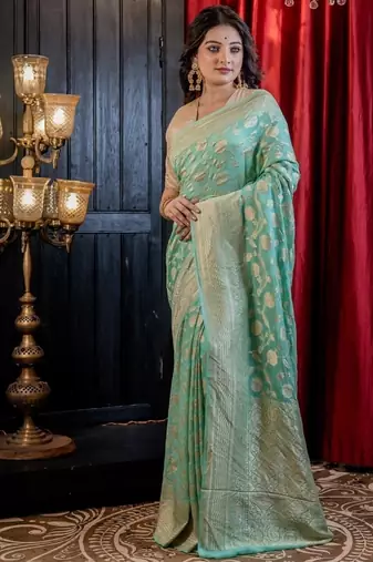 green woven georgette saree