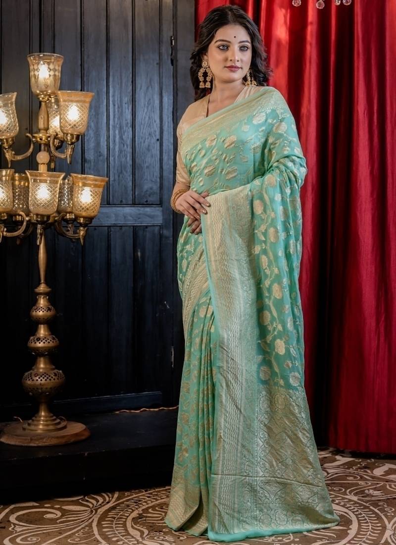 green woven georgette saree
