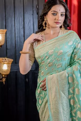 green woven georgette zari woven all seasons sarees