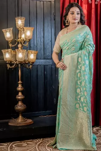 green woven georgette zari woven all seasons sarees
