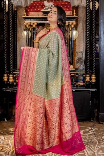 teal woven georgette saree