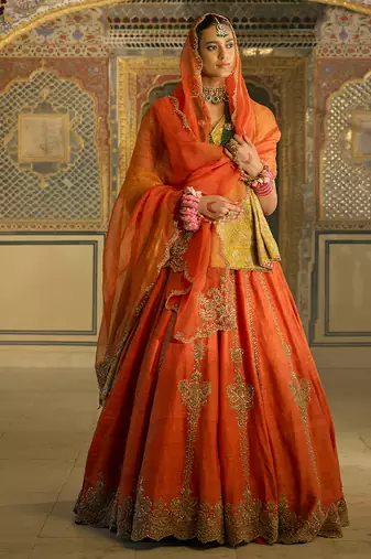 orange embroidered silk lehenga set
