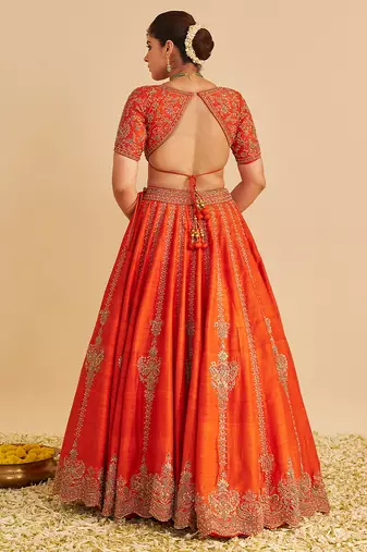 orange embroidered silk lehenga set