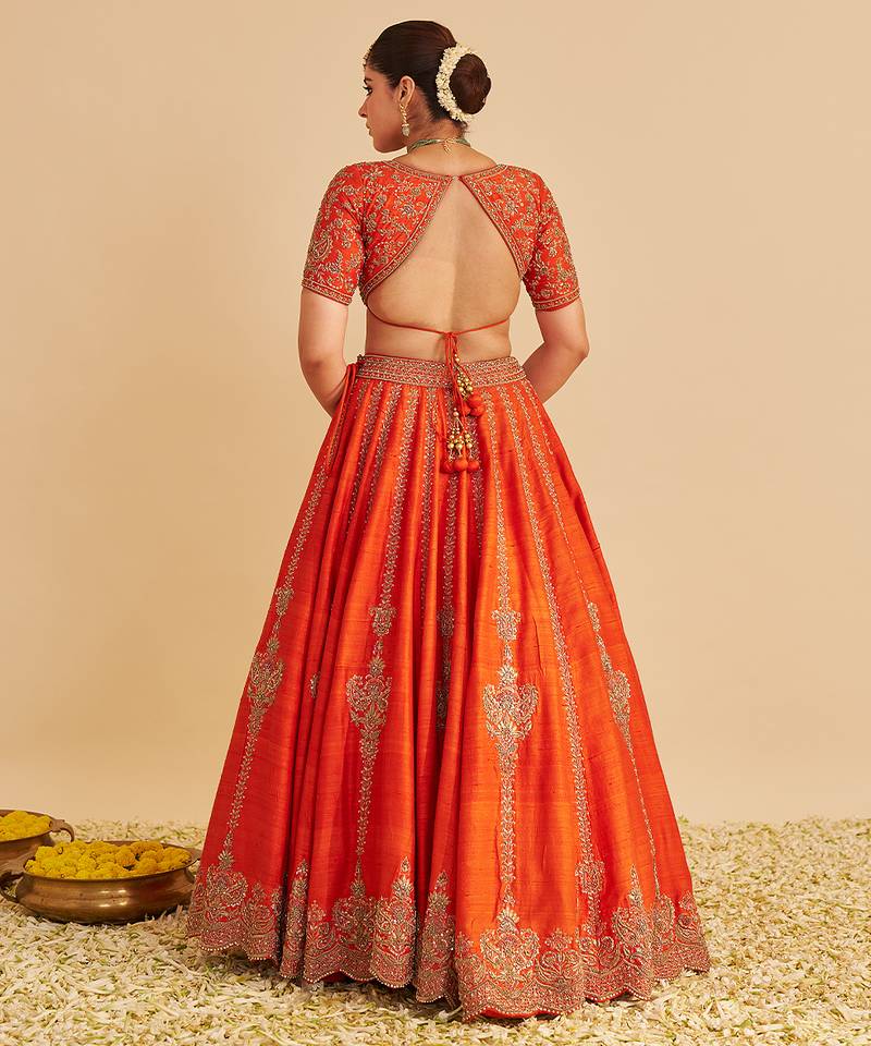 orange embroidered silk lehenga set