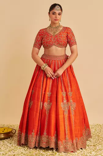 orange embroidered silk lehenga set