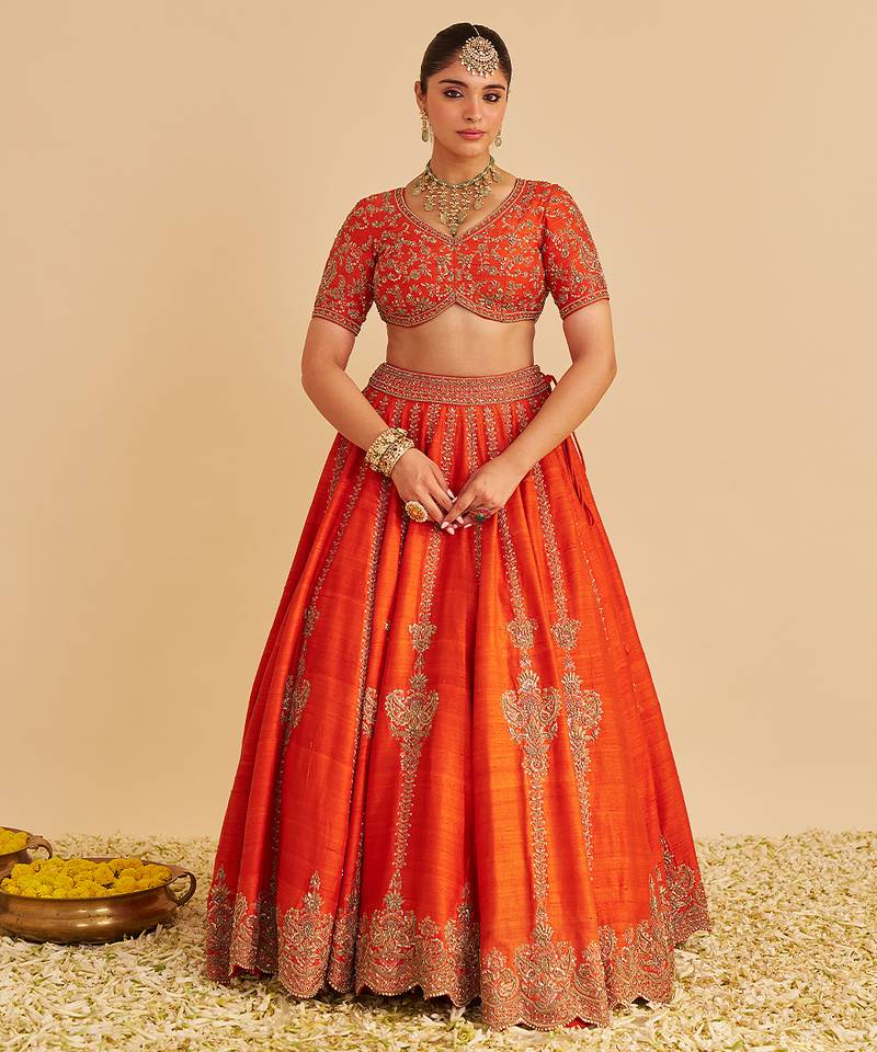 orange embroidered silk lehenga set