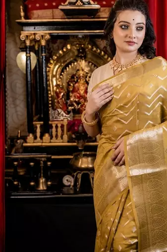green woven faux silk blend blend zari woven all seasons sarees