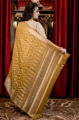 green woven faux silk blend blend zari woven all seasons sarees