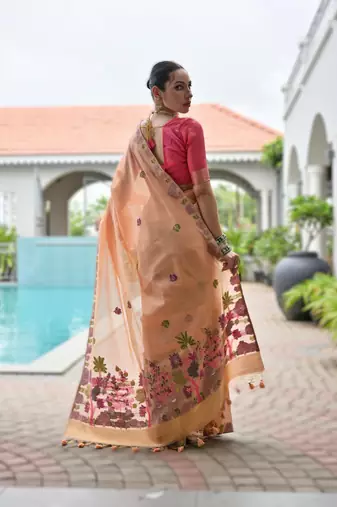 Peach premium soft chanderi cotton saree with resham flower weaving & contrast blouse