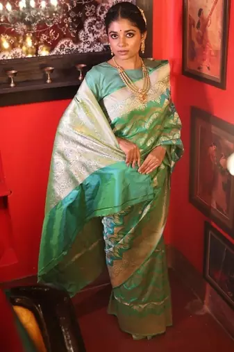 green hand woven katan silk blend zari woven all seasons sarees