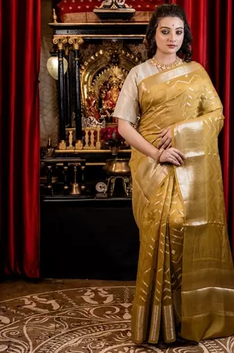 green woven faux silk blend blend zari woven all seasons sarees