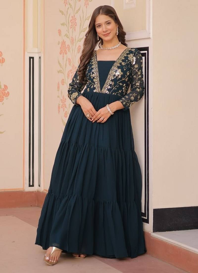 Teal green faux blooming embroidered sequins zari work gown