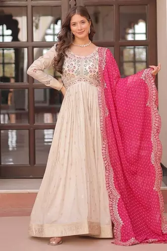 Off-white jacquard gown with pink dupatta