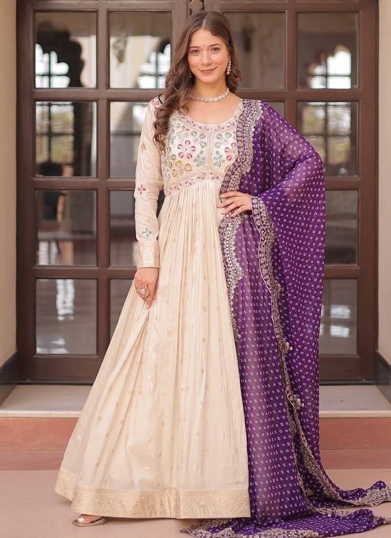 Off-white jacquard gown with purple dupatta
