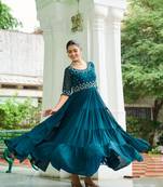 Blue designer faux blooming embroidered gown with bead work