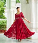 Red designer faux blooming embroidered gown with bead work