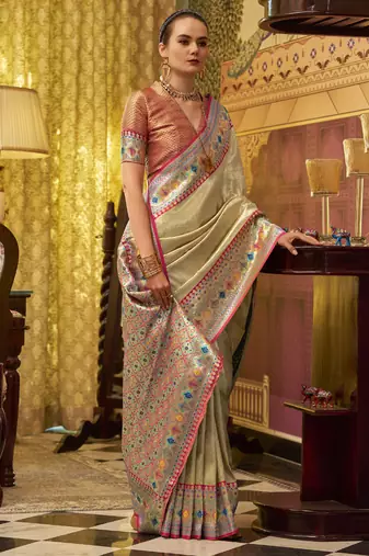 cream tissue silk blend with zari weaving festival wear saree