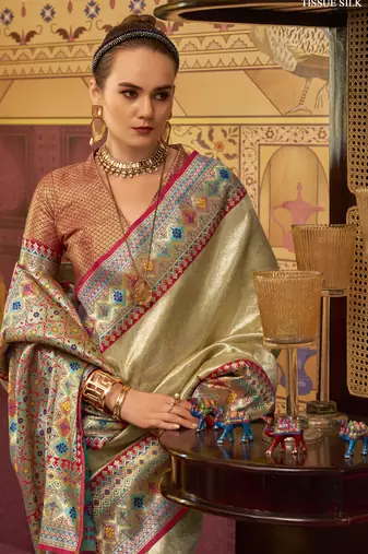 cream tissue silk blend with zari weaving festival wear saree