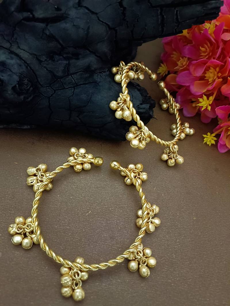 Set of 2 gold-plated twisted kada bracelet with clustered ghungroo charms