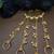 Set of 2 gold-plated chand hathphool with multi-chain ghungroo drops multi finger ring bracelets