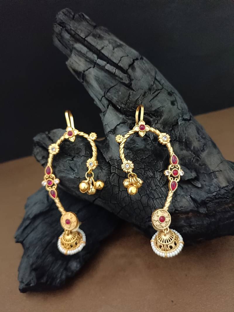 Gold-plated jhumki bugadi earcuff with red stones & pearl detailing