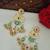 Gold plated pachi kundan studded ghungaroo kashmiri green drop earrings