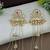 Gold-plated kashmiri long jhumka earrings with pearl & ghungroo chains