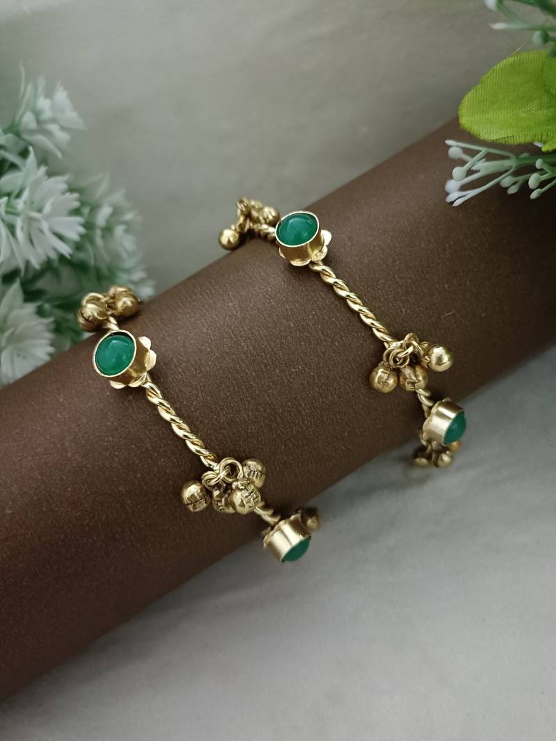 Women 2 brass kundan gold-plated bangle-style bracelet