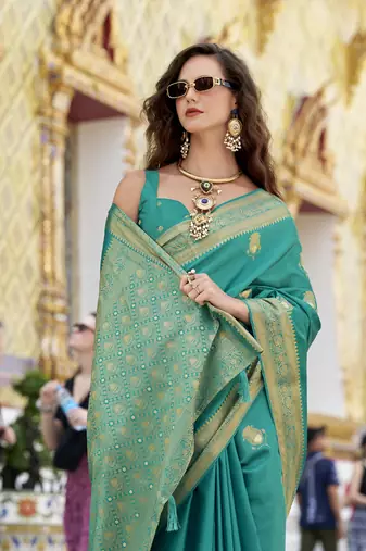 turquoise  satin silk blend with beautiful zari weaving border & designer pallu