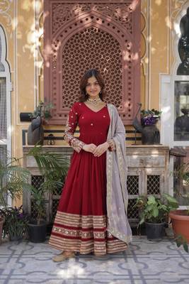 Rusty red faux blooming zari embroidered work gown 1