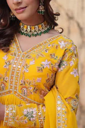 Yellow faux blooming embroidery zari work gown