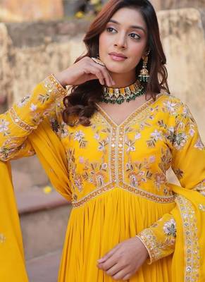 Yellow faux blooming embroidery zari work gown 5