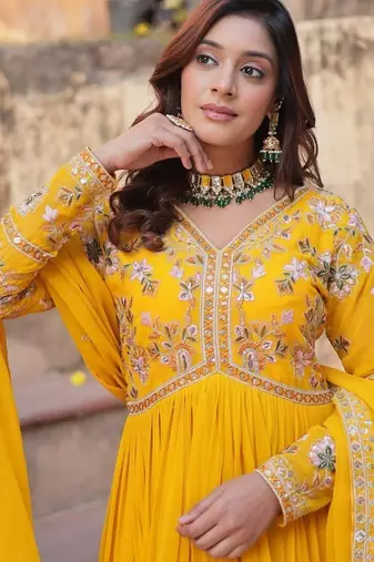 Yellow faux blooming embroidery zari work gown